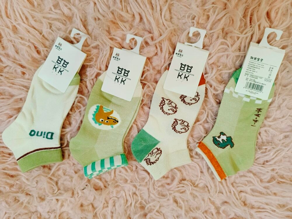2025/08/1000951400-scaled.jpg Patpat dino socks - Image 1