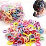 24-25 Pcs Mini Elastic Hair ties Multi-Color Hair Ties in suitcase bag