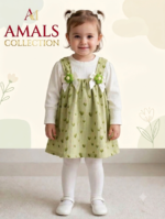 Green corduroy pinafore dress features a sweet heart pattern and charming white bow accents with floral details - Image 2