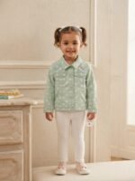 stylish light-wash denim jacket featuring playful sleeve graphics and a button-up front, perfect for your little trendsetter